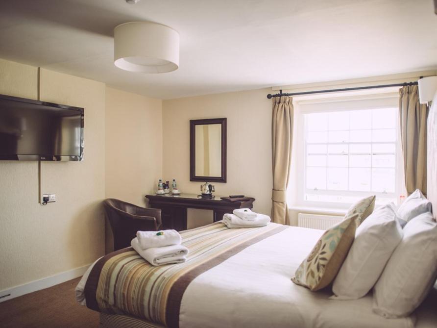 Hotel The George à West Bay Chambre photo